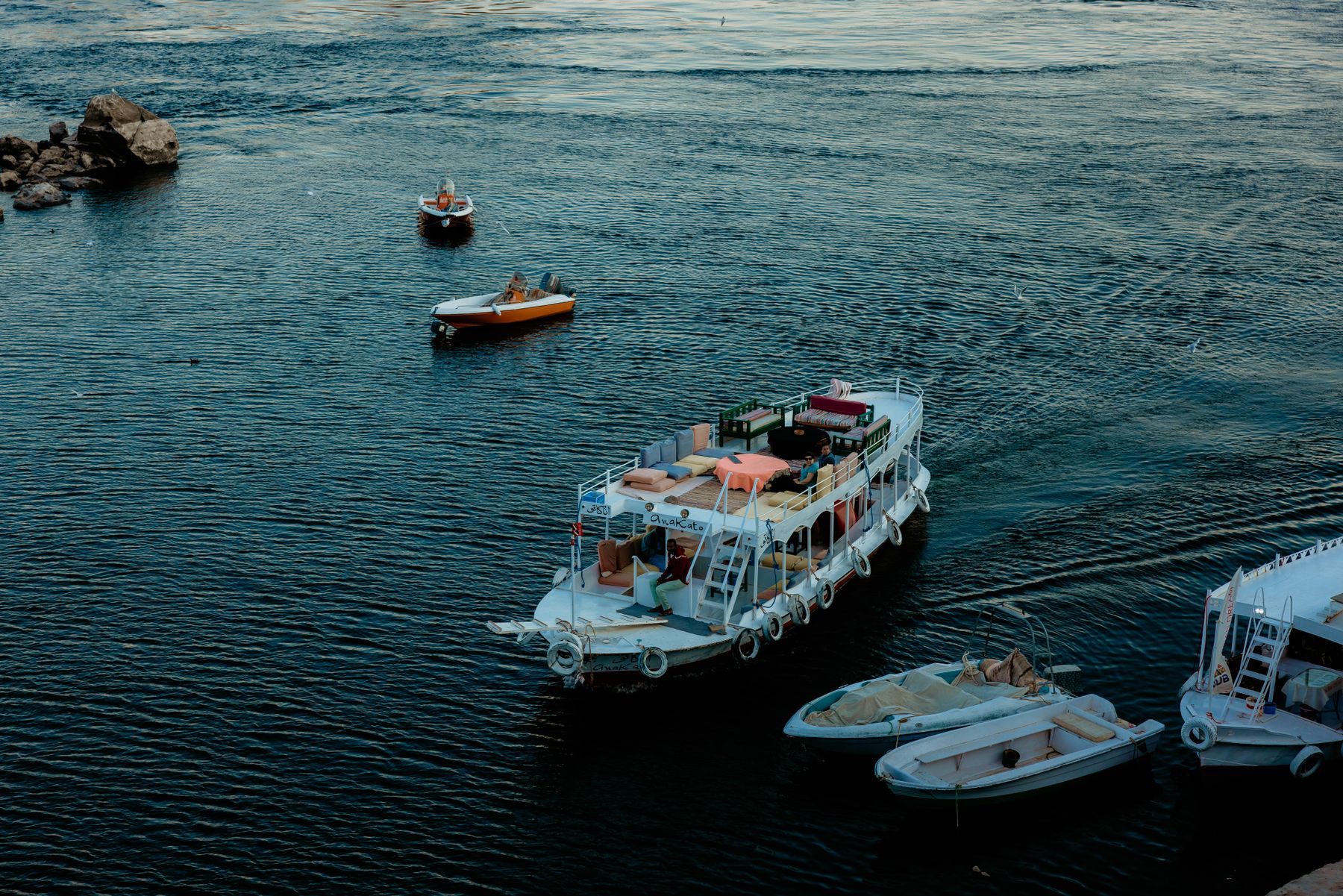 Boats sailing on the Nile River in Aswan Egypt