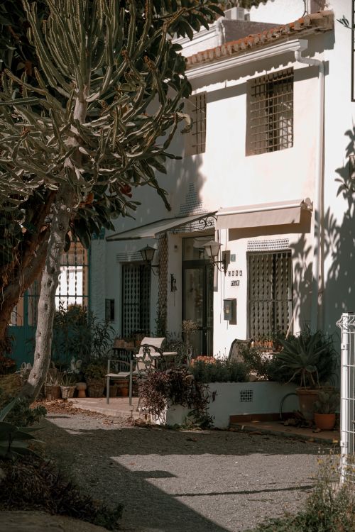 Free Elegant Spanish villa with garden, cacti and warm tones in Altea, Spain. Stock Photo