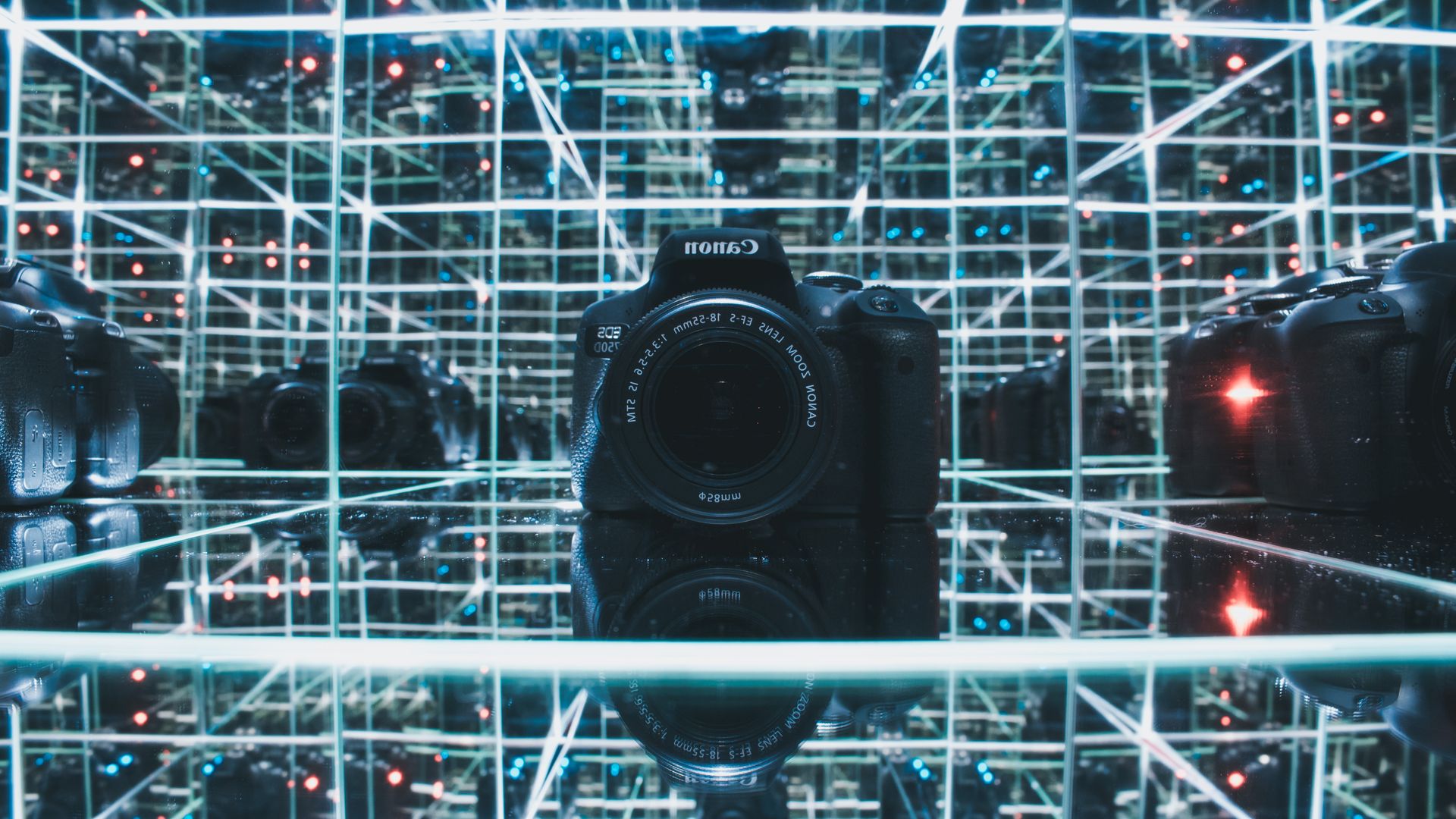 Explore the striking reflections of a camera in a mirrored infinity room. Perfect for tech and design themes.