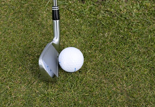 Free Silver Wedge Golf Club Beside Ball Stock Photo