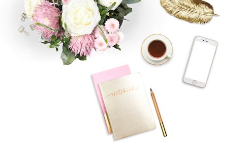 Free stock photo of flatlay, flowers, notebook