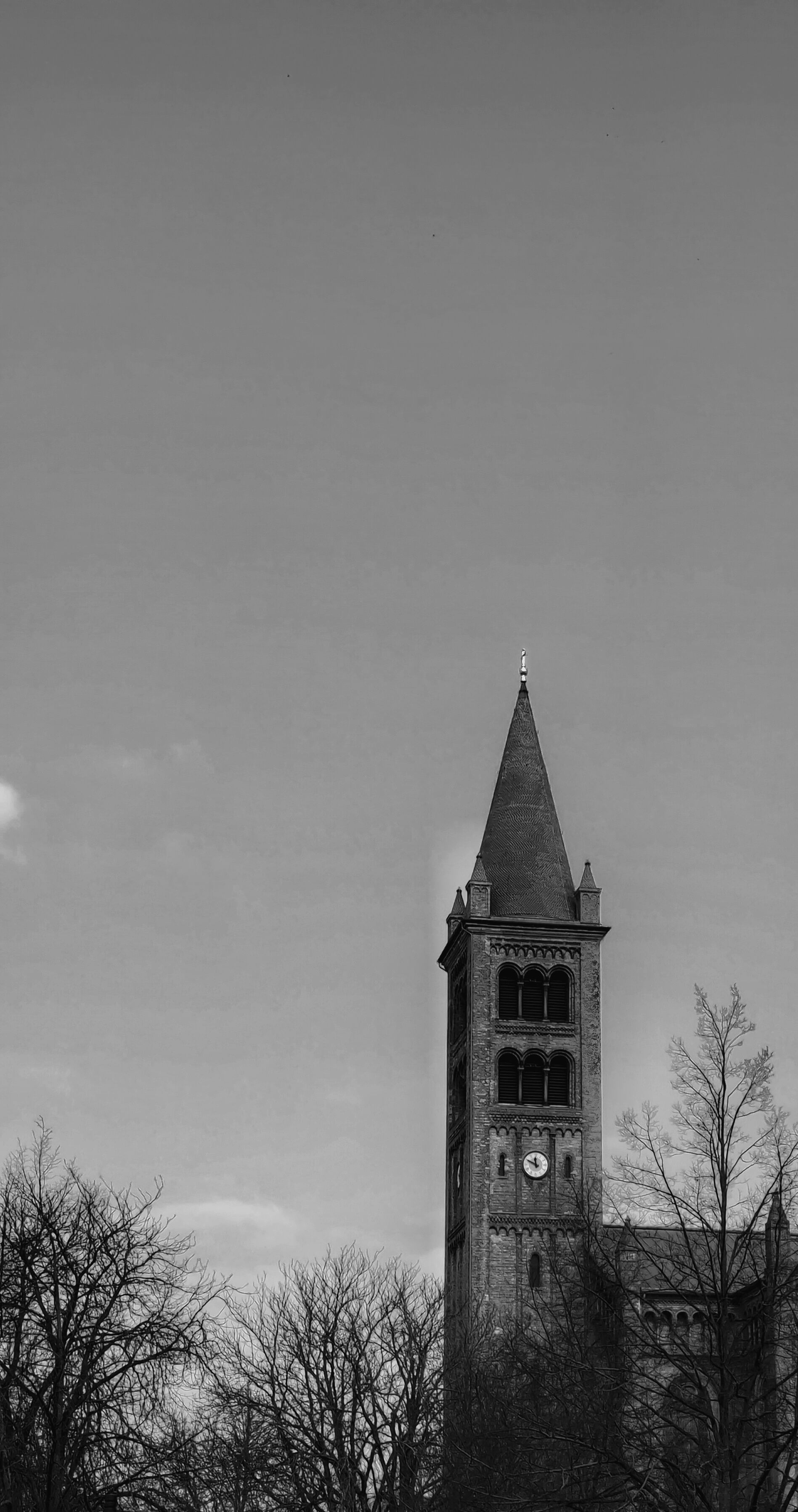 A black and white photo of a church tower · Free Stock Photo