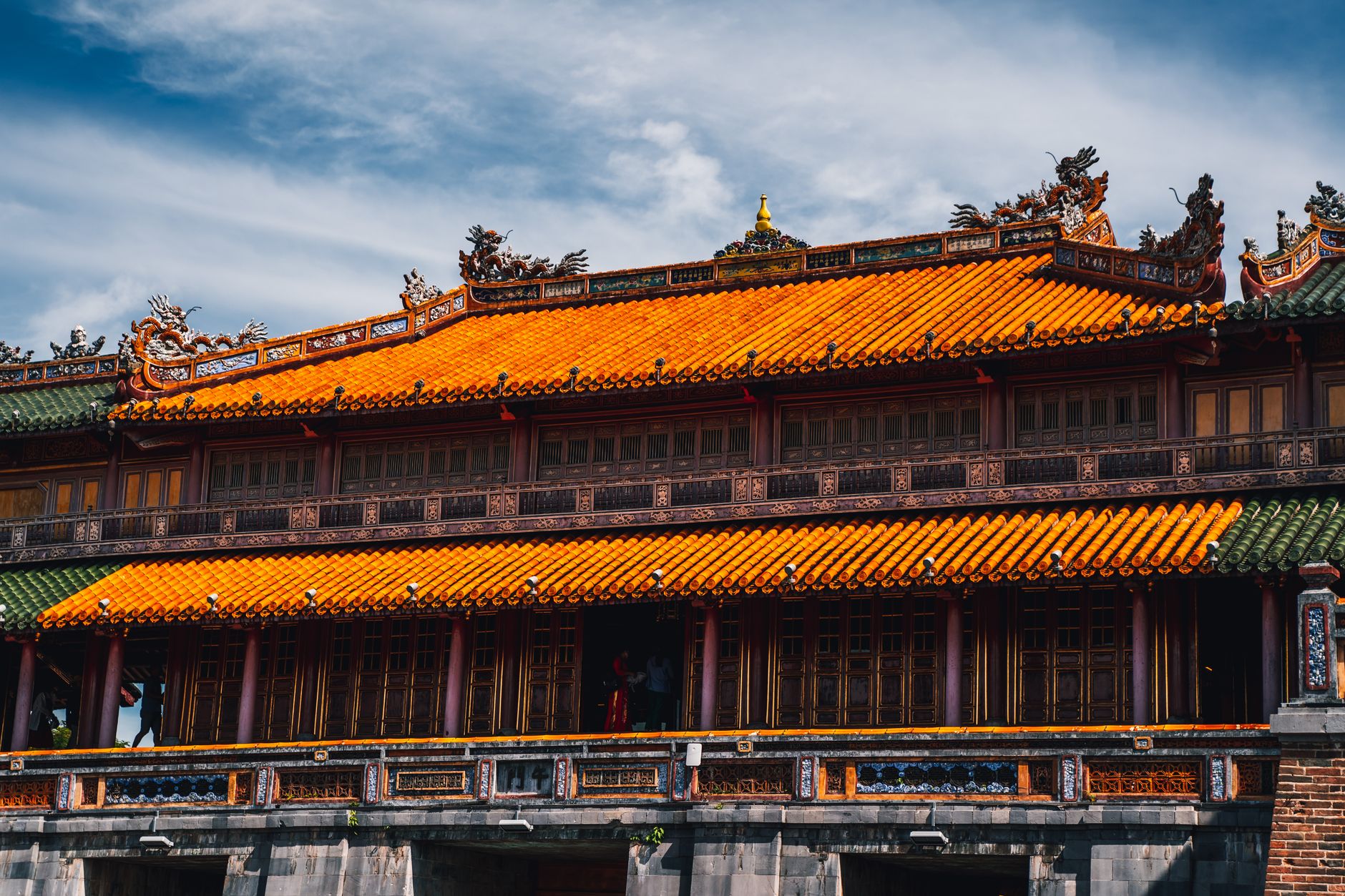 Captivating image of traditional Vietnamese architecture showcasing vibrant roof design in Hue.