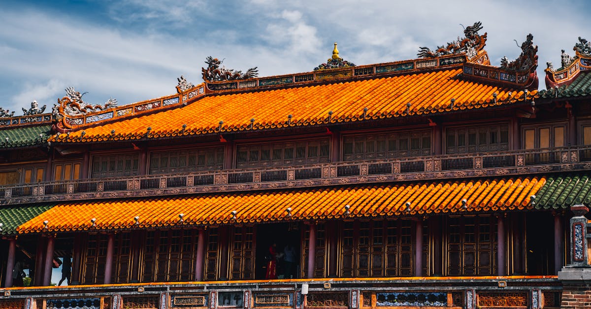 Captivating image of traditional Vietnamese architecture showcasing vibrant roof design in Hue.
