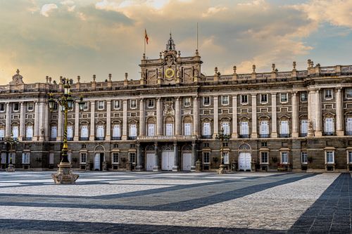 Free Elegant architectural facade of the Royal Palace of Madrid, captured during sunset. Stock Photo