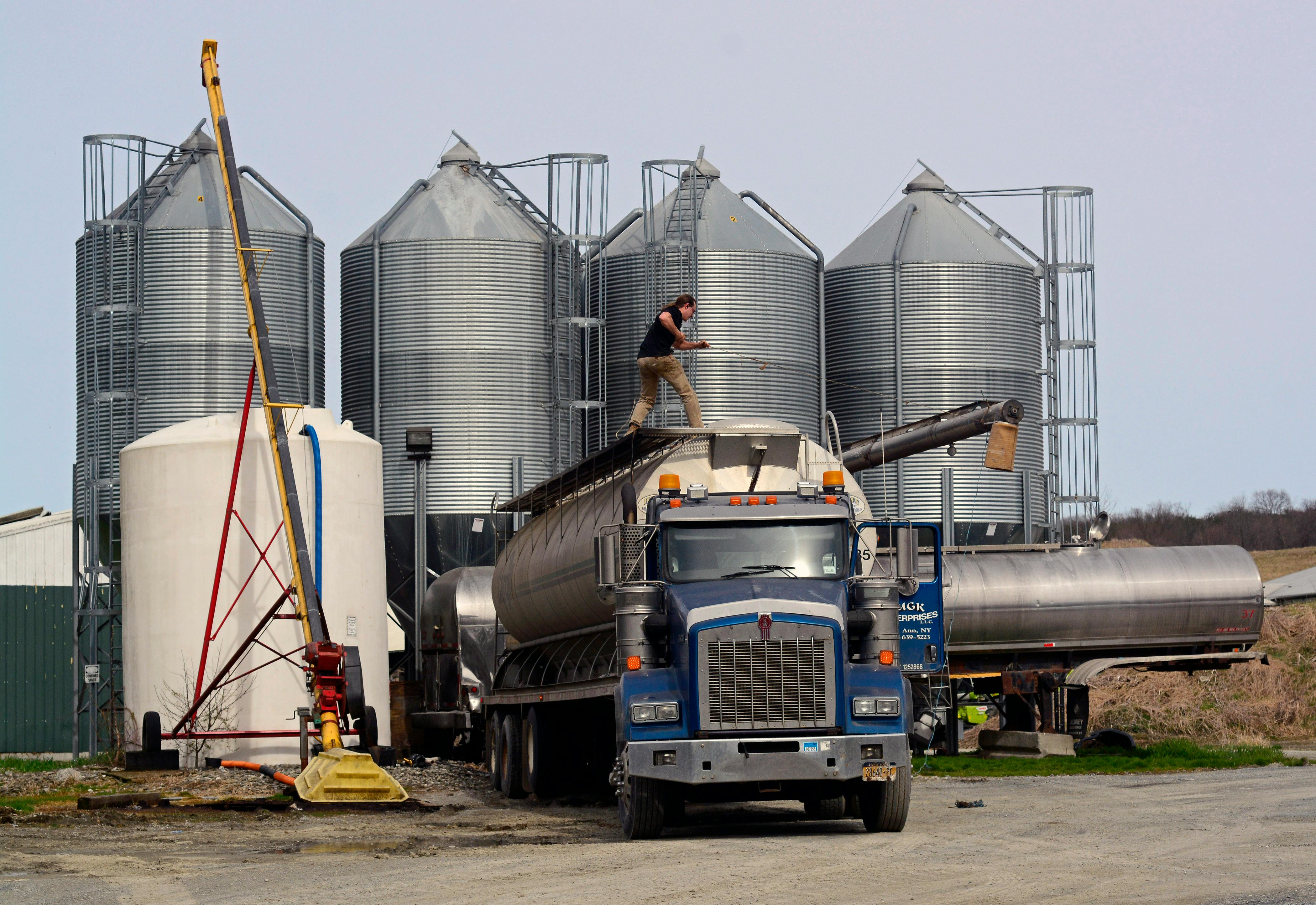 Technician installing truck air fittings
