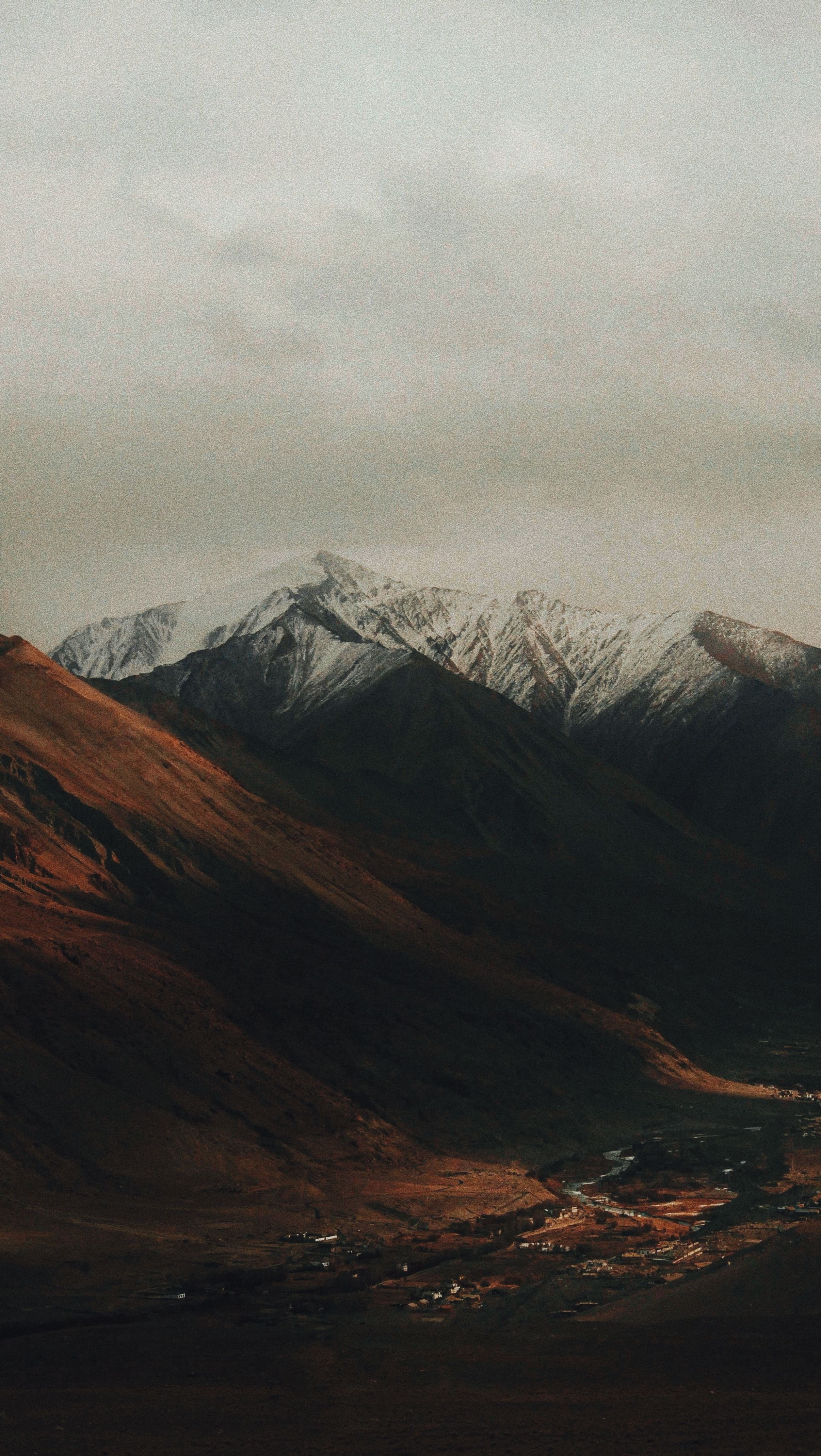 A photo of a mountain range with snow · Free Stock Photo