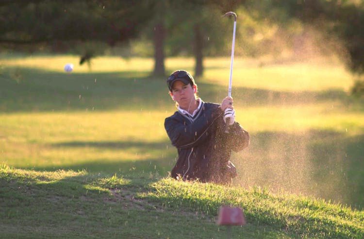 Man Playing Golf