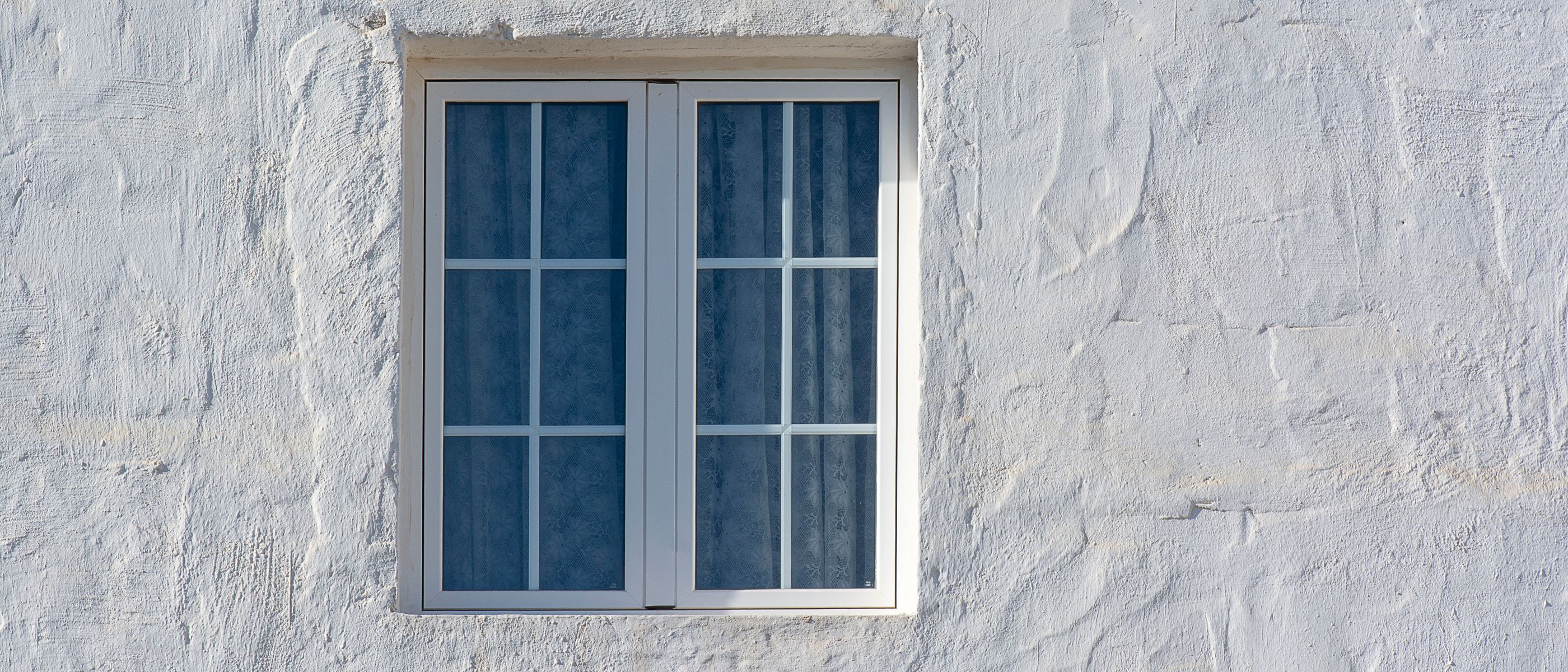 Exterior Painting in Chalk Farm — a decorator at work mid-project