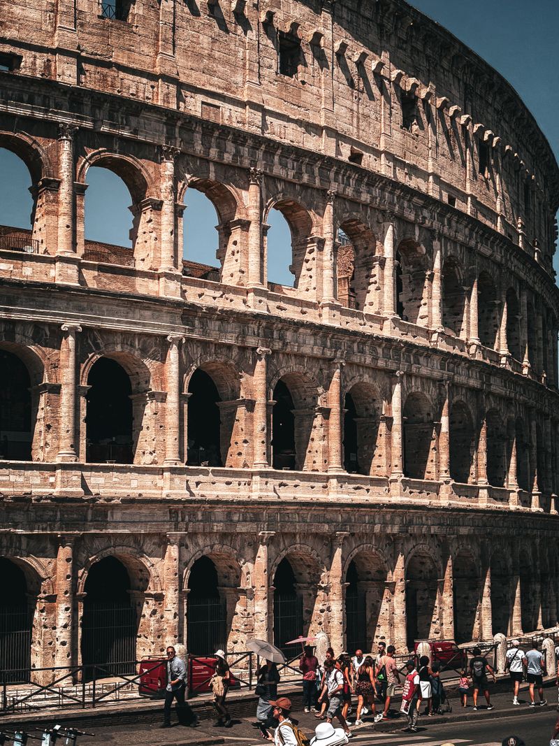Colosseum exterior with arched tiers in Rome