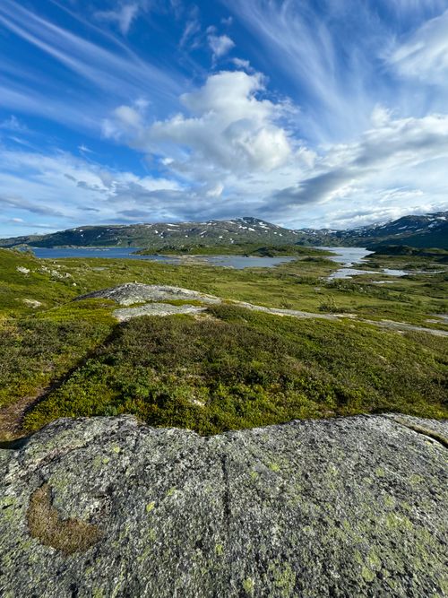 Free Beautiful mountain landscape featuring lush greenery and serene lakes under a vibrant sky. Stock Photo