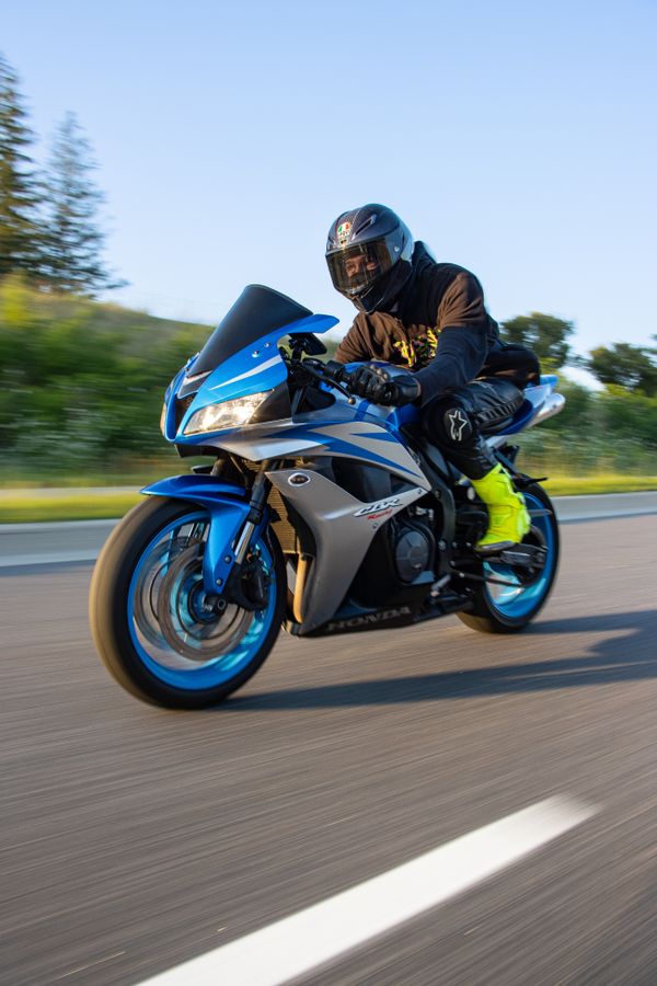 Two People Riding a Motorcycle · Free Stock Photo