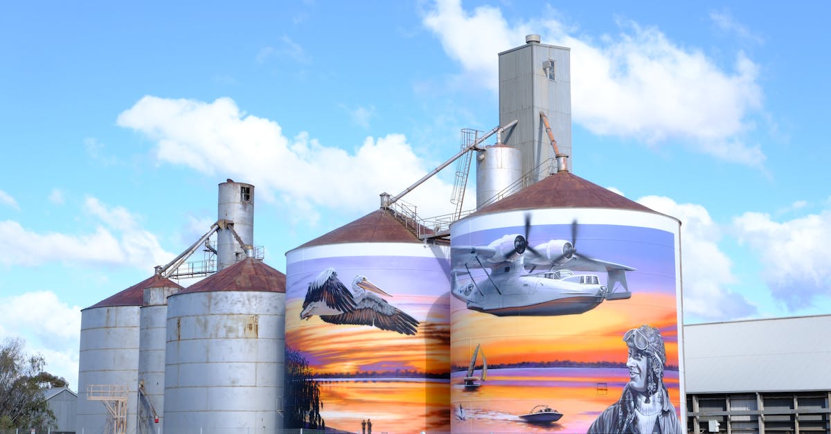A large mural on the side of a grain silo