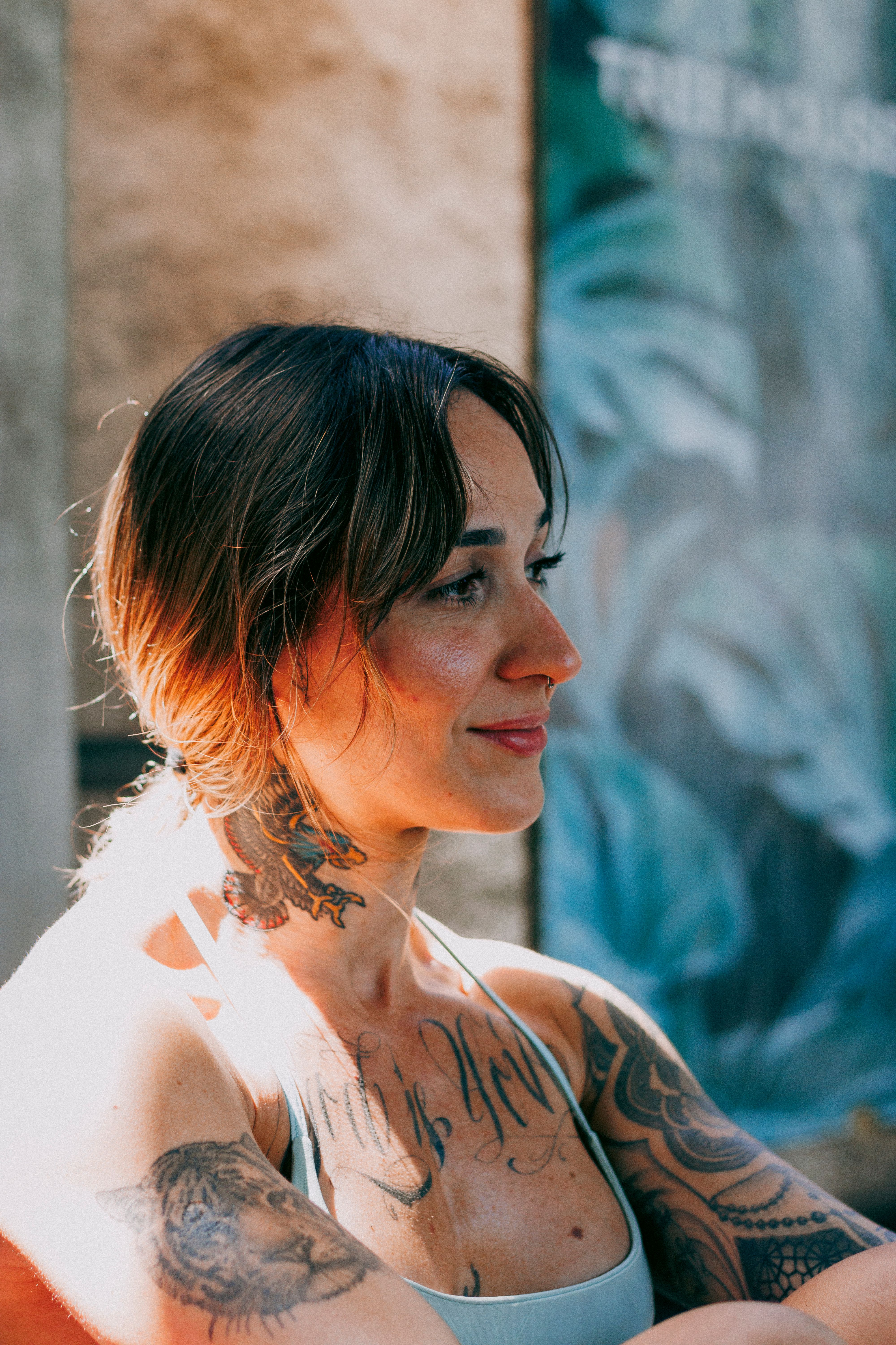 Traditional lady-head tattoo on a shoulder