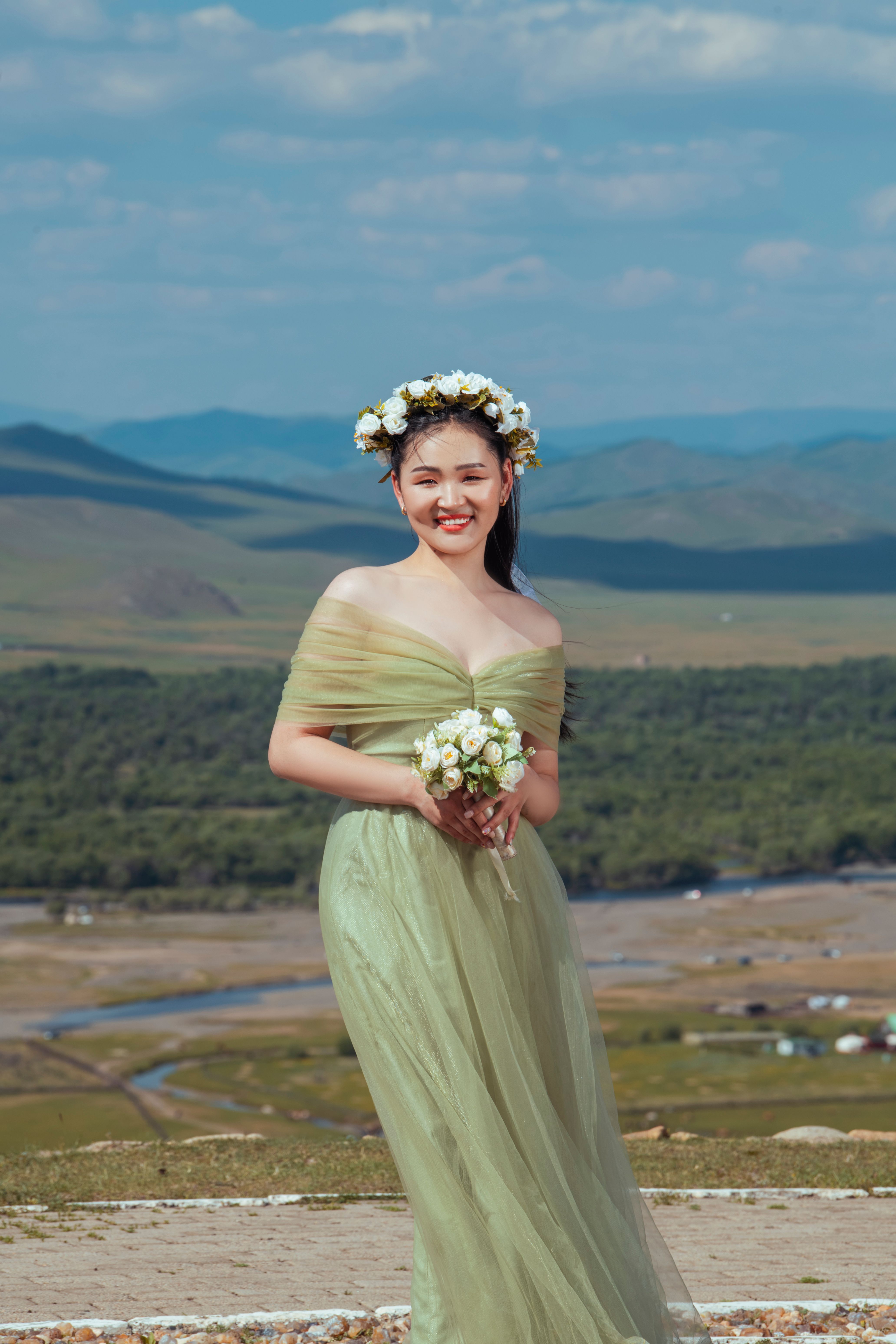Smiling Woman in Dress and with Flowers · Free Stock Photo