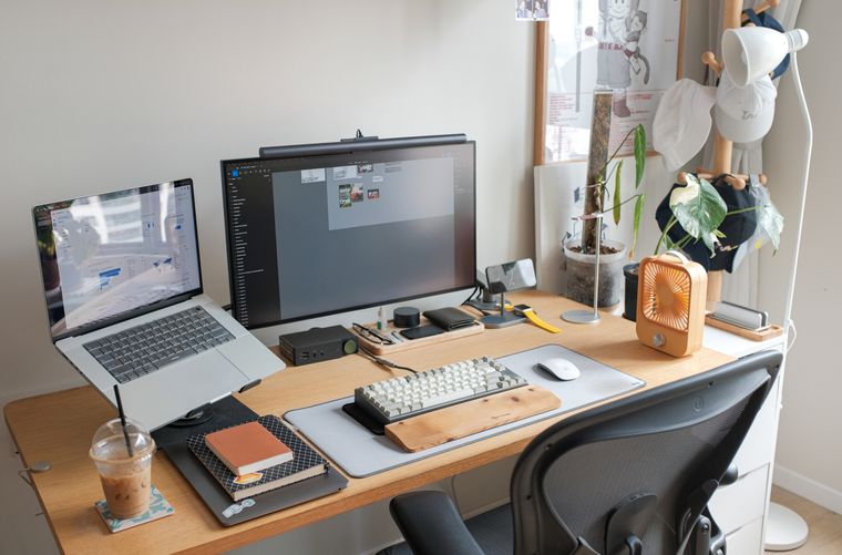 Desk setup with a laptop and monitor, photo by Huy Phan on Pexels