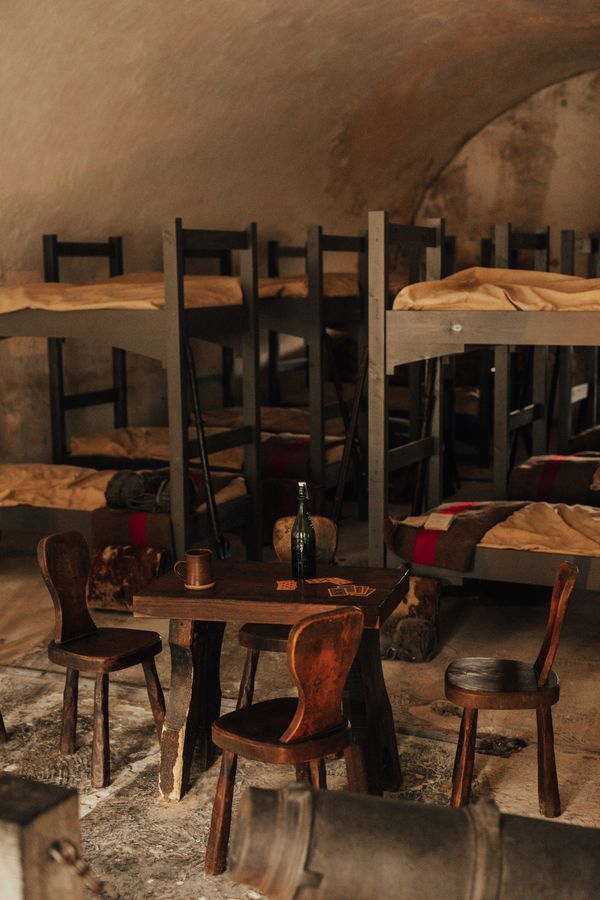 Bunk room with table and chairs