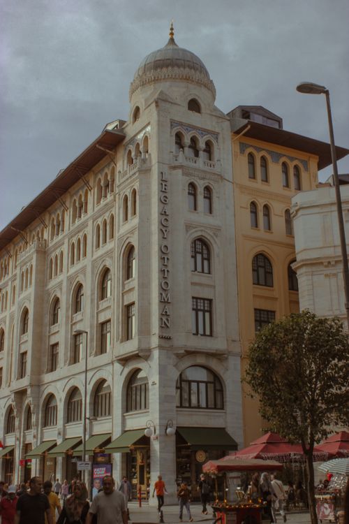 Free Elegant view of the Legacy Ottoman Hotel with bustling city street in İstanbul. Stock Photo