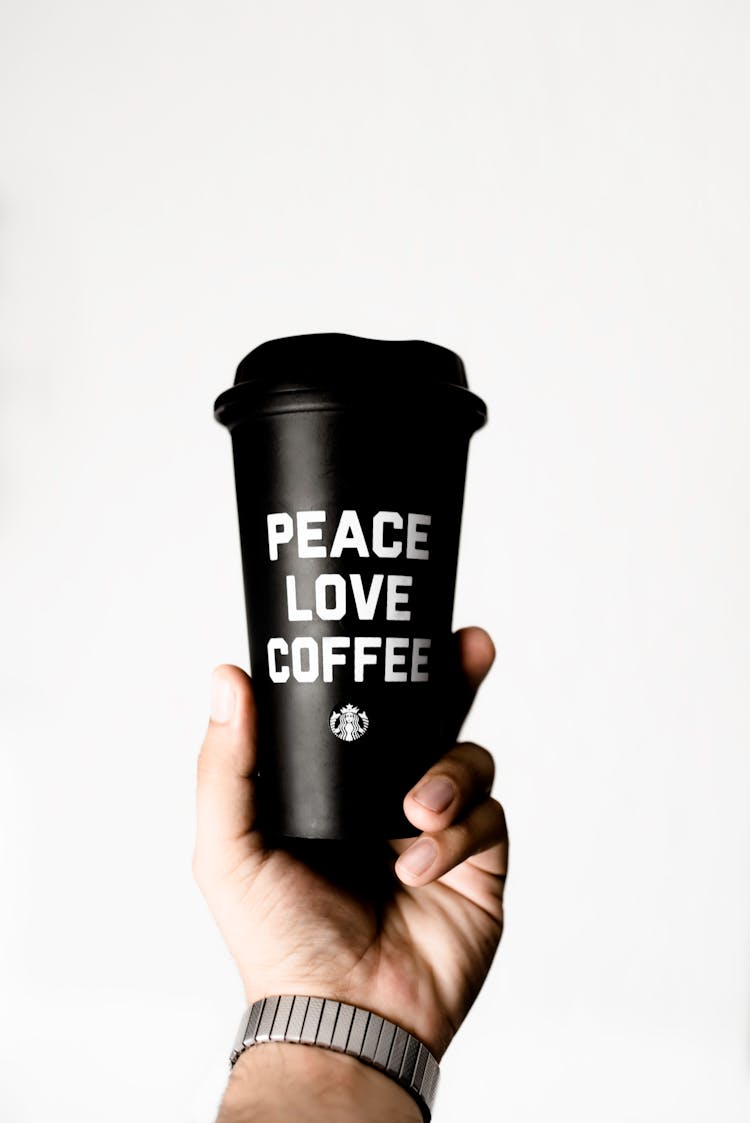 Person Holding Starbucks Coffee Tumbler