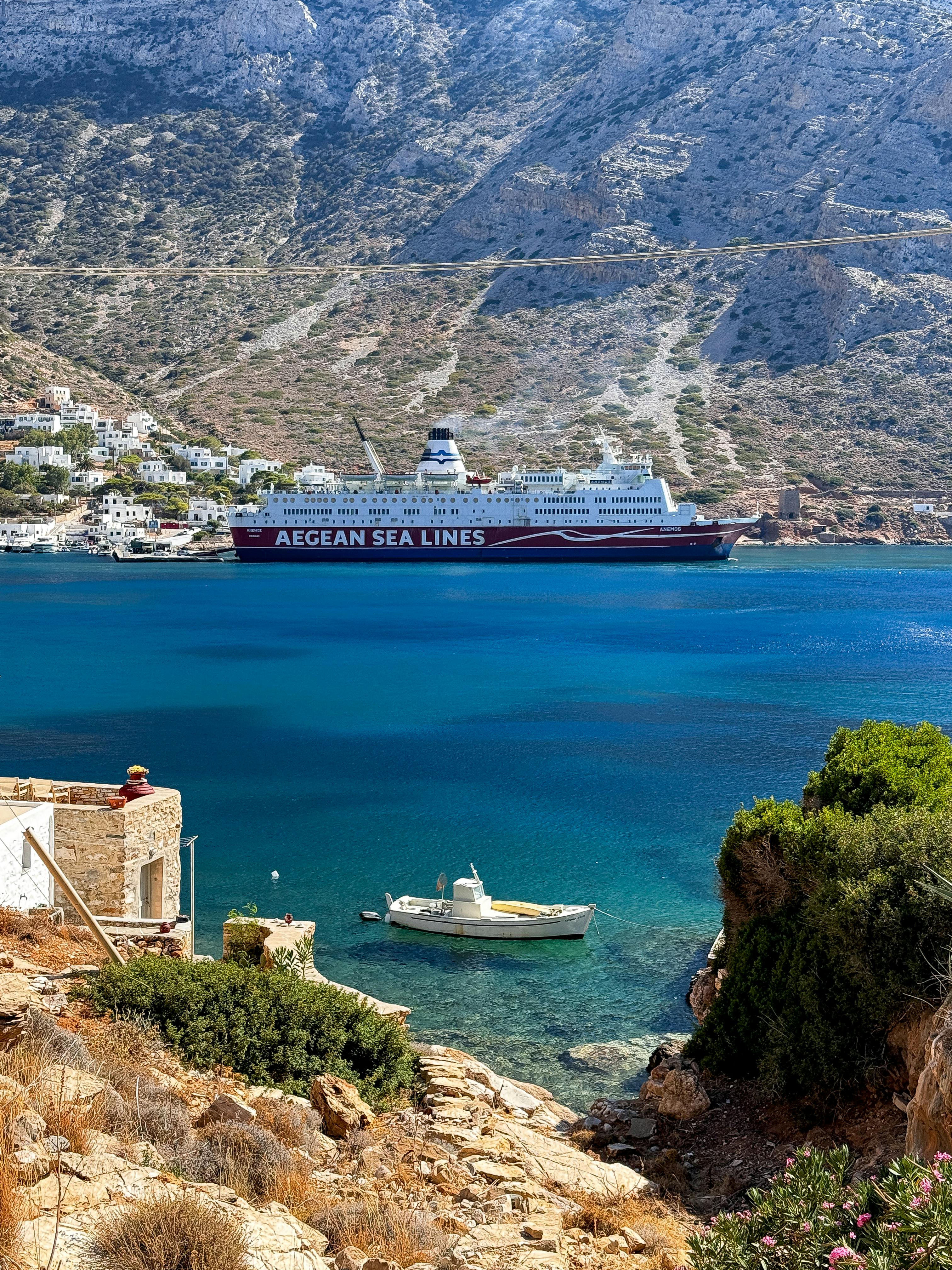 fishing boat and ferry in greece