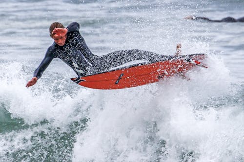 Free Man Surfboarding Stock Photo