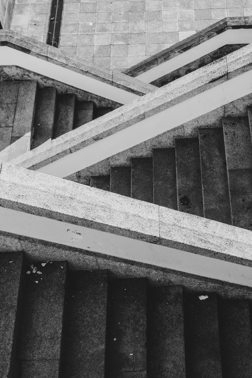 Free Artistic view of a monochromatic concrete staircase in Porto, Portugal, highlighting urban architecture. Stock Photo