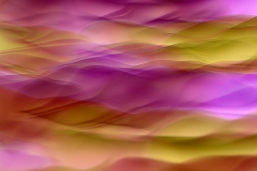 Vibrant abstract artwork with colorful wavy patterns resembling natural formations.