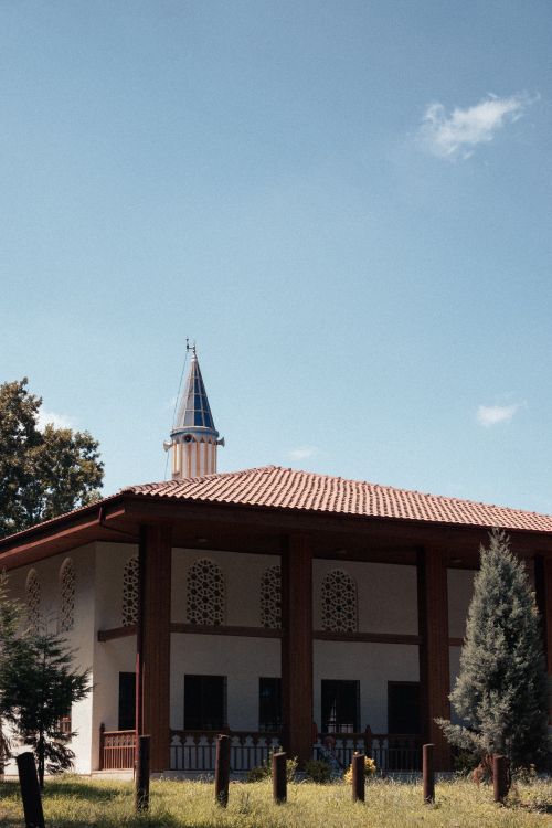 Free A rustic building with a spire in Sakarya, Türkiye, under a clear summer sky. Stock Photo