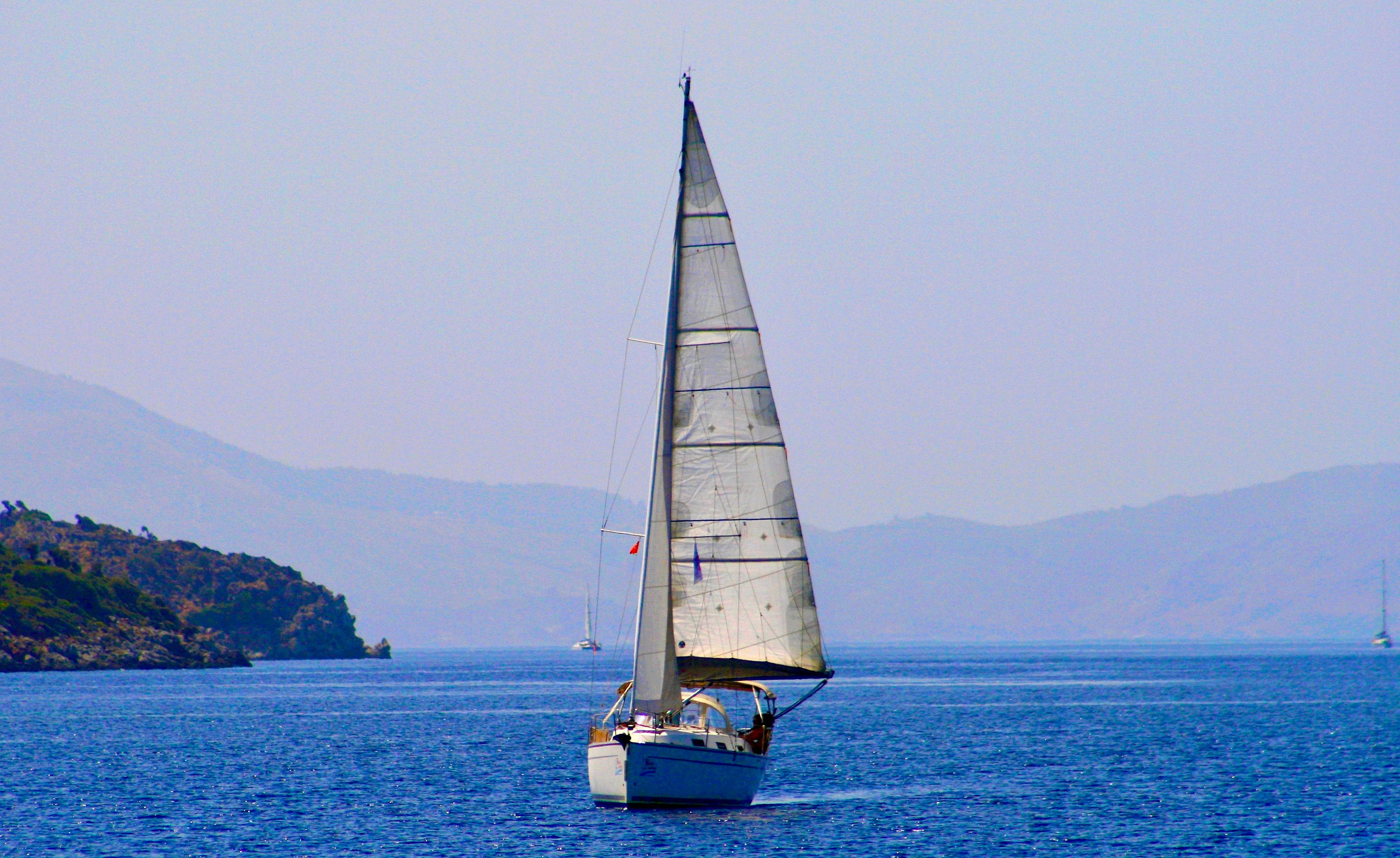 Ultimate Full-day Boat Tour from Antalya with Lunch and Foam Party Review: The Ultimate Turkish Riviera Adventure Review 2026 - A stunning sailboat cruising on clear blue waters near Marmaris, Türkiye.