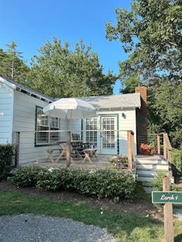 Serene cottage with a porch and garden on sunny Shelter Island, NY.