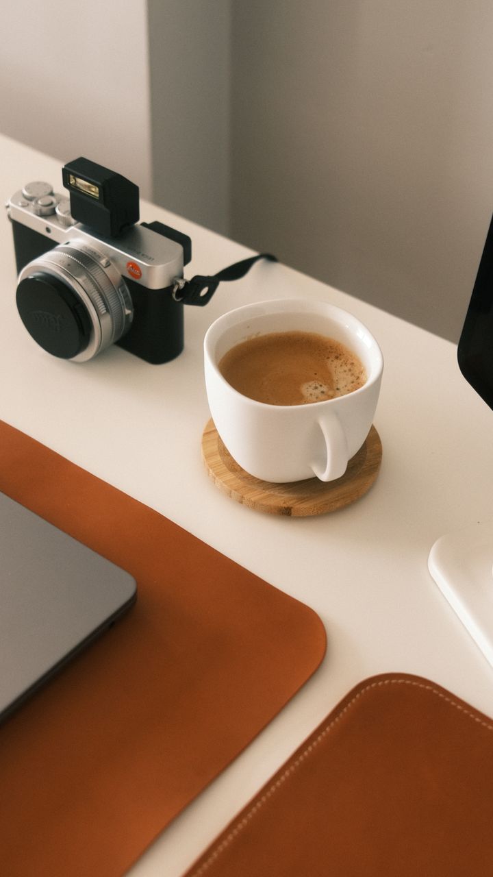 Neutral faux leather coasters placed on a dollar tree coffee bar design counter