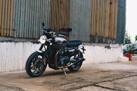 Motorcycle Parked Outside A Building