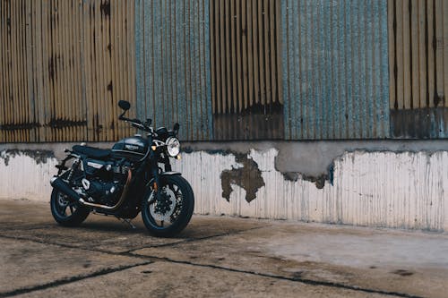 Black Motorcycle Parked Near Building