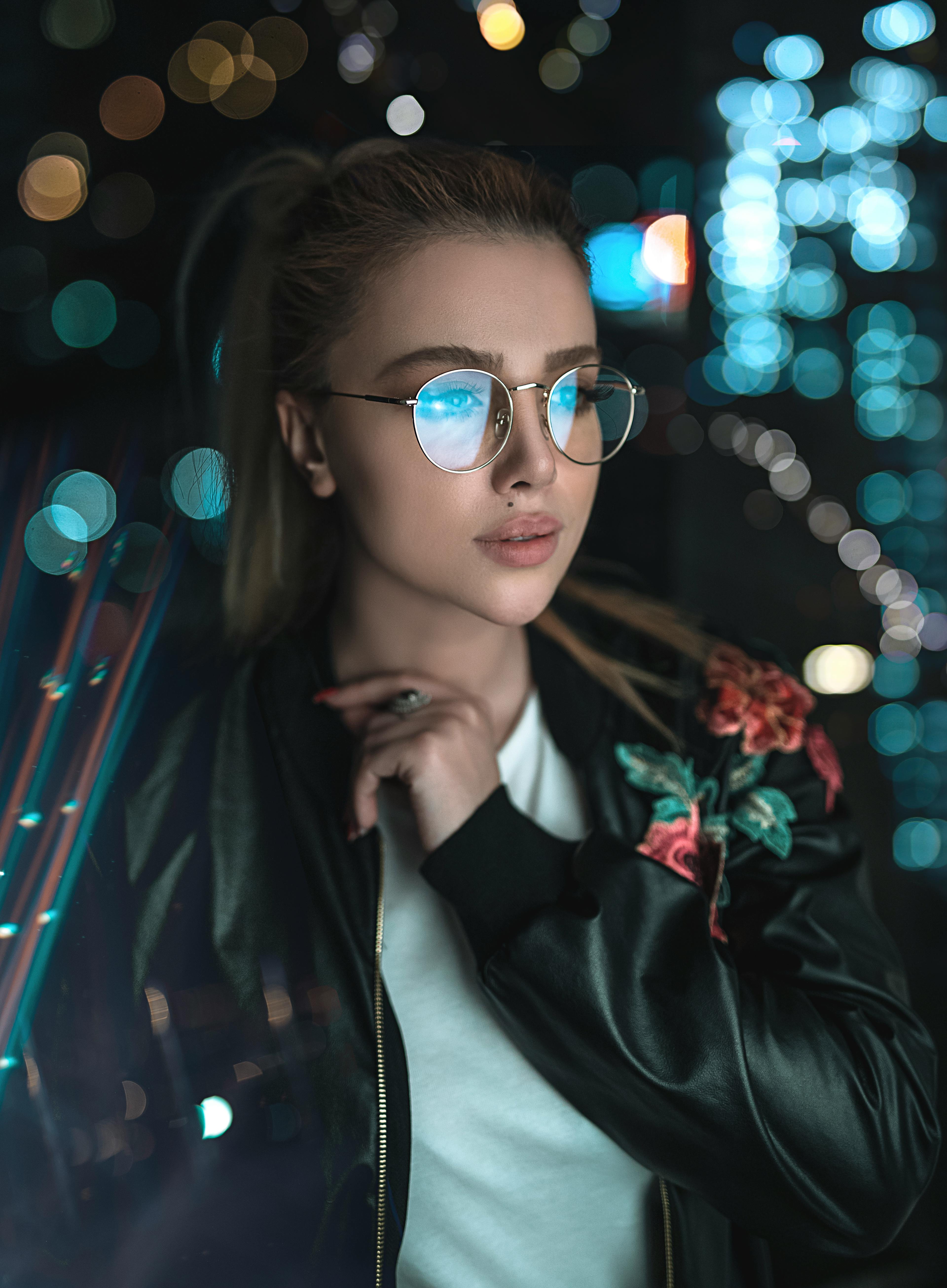 Photo of Woman Wearing Black Leather Jacket