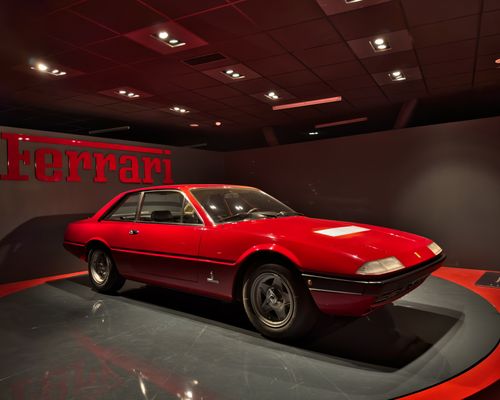 Free Classic red Ferrari showcased at an automotive museum in Turin, Italy. Iconic Italian design. Stock Photo