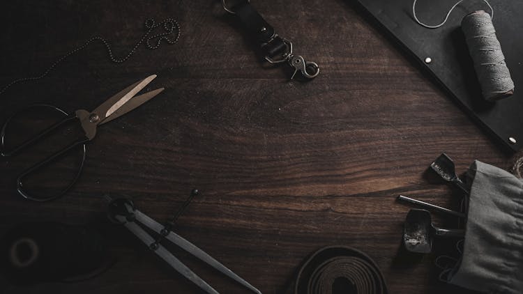 Tailoring Tools On A Wooden Surface