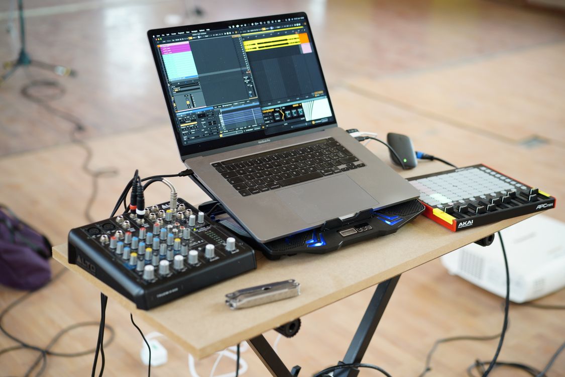 Computer Mix Table A laptop and a mixer on a table · Free Stock Photo