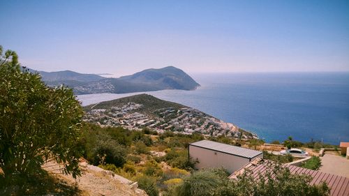 Free Scenic aerial landscape of Kaş, Antalya overlooking the Mediterranean Sea with lush hills and vibrant architecture. Stock Photo