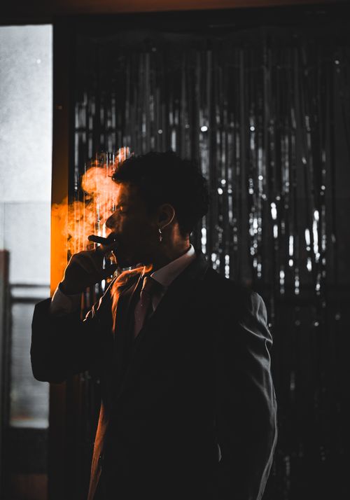 Free Silhouette of a man smoking in Buenos Aires, backlit with dramatic lighting. Stock Photo