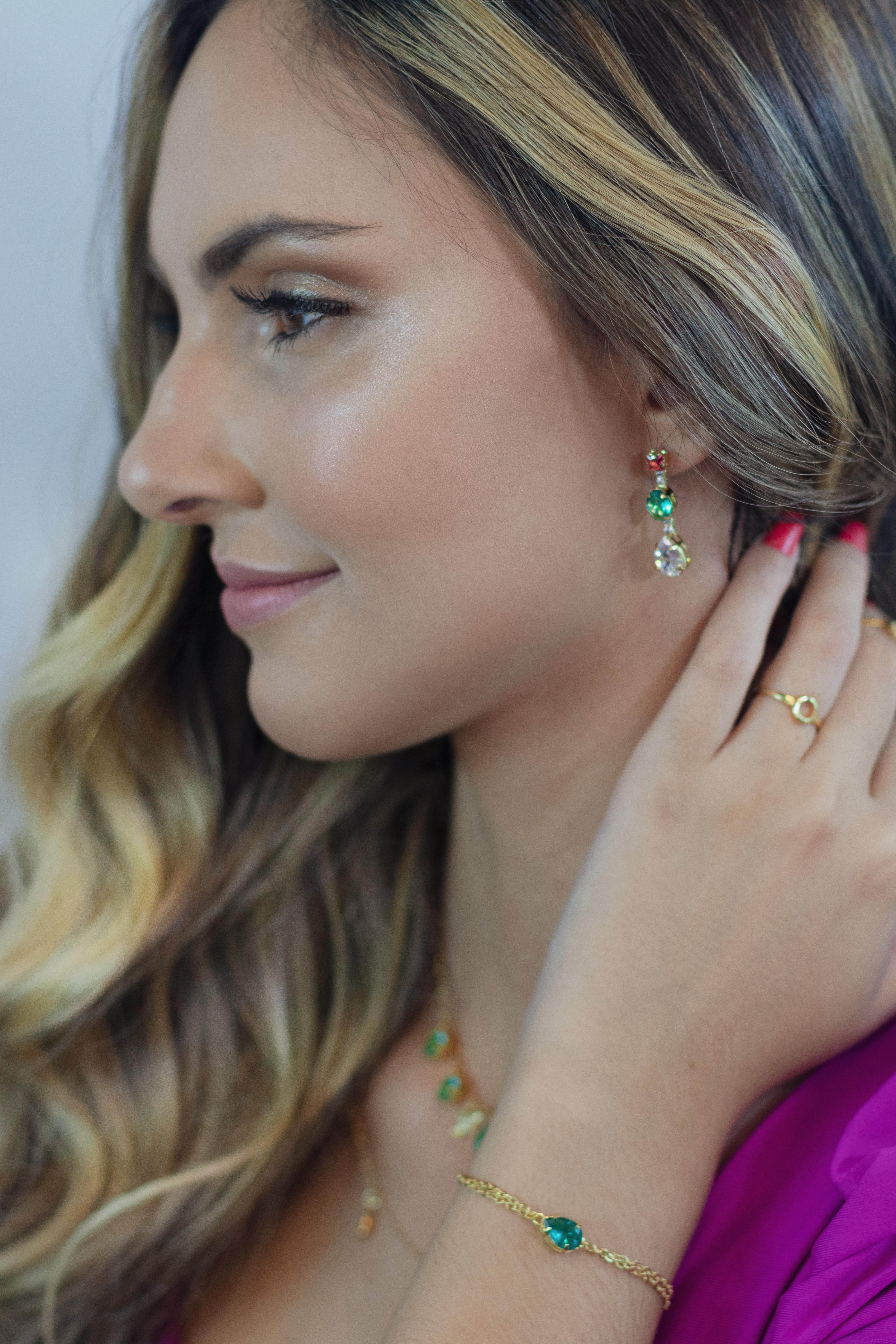 Side profile portrait of a woman with luxurious jewelry, exuding elegance and glamour.