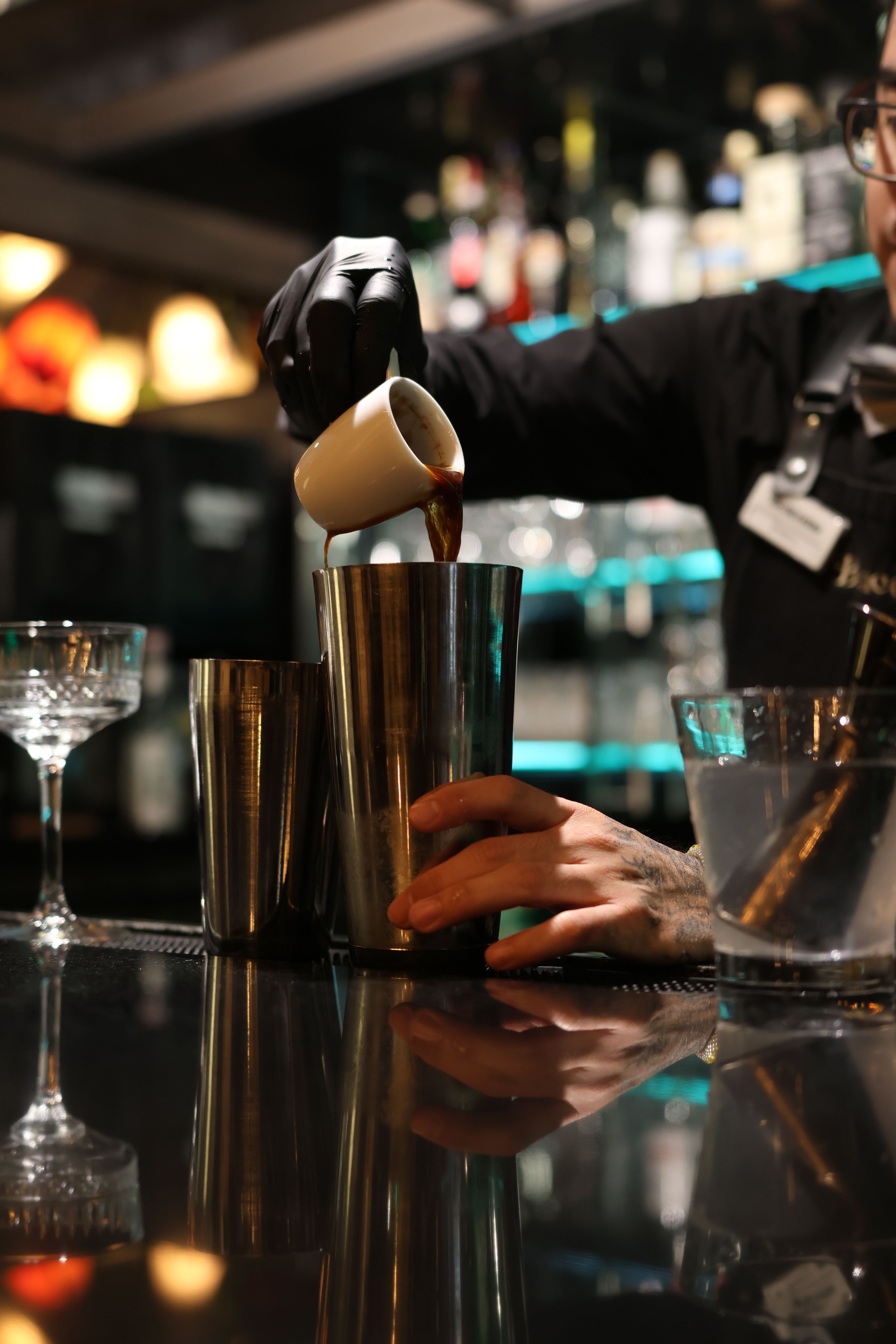 A bartender mixing a drink
