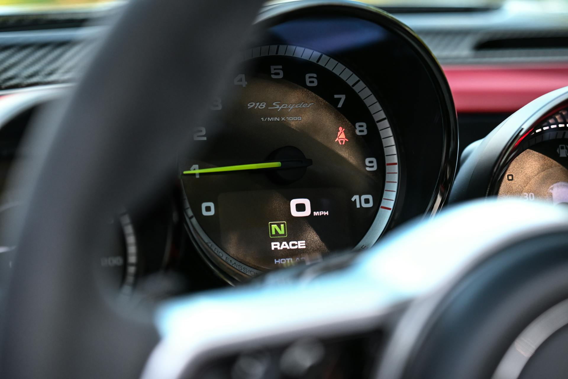 A dashboard with gauges and a speedometer