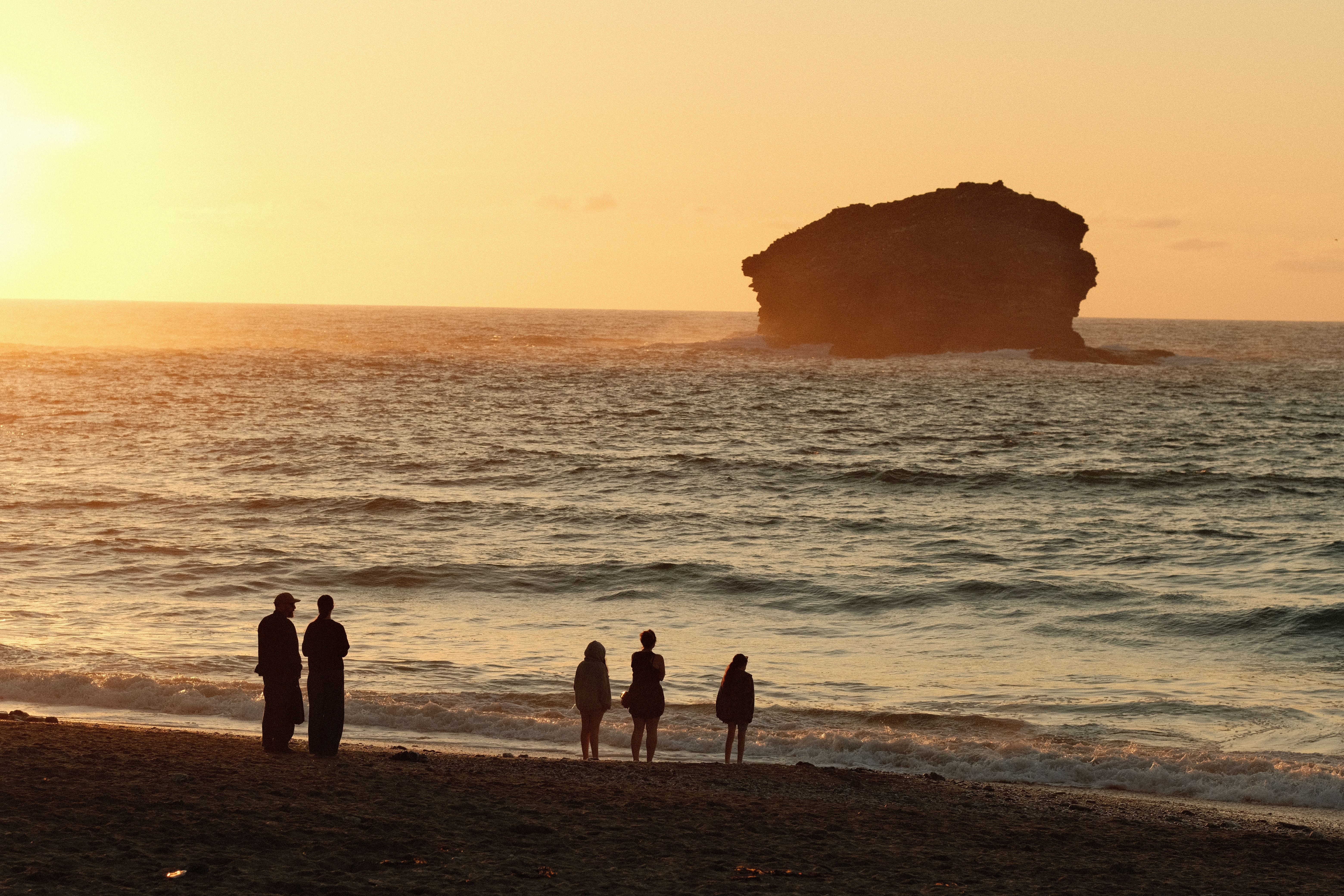 Silhouette of People during Sunset · Free Stock Photo
