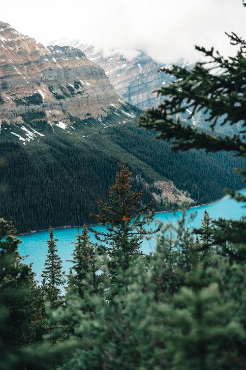Free Spectacular view of a mountain range and turquoise lake in Banff National Park, Canada. Stock Photo