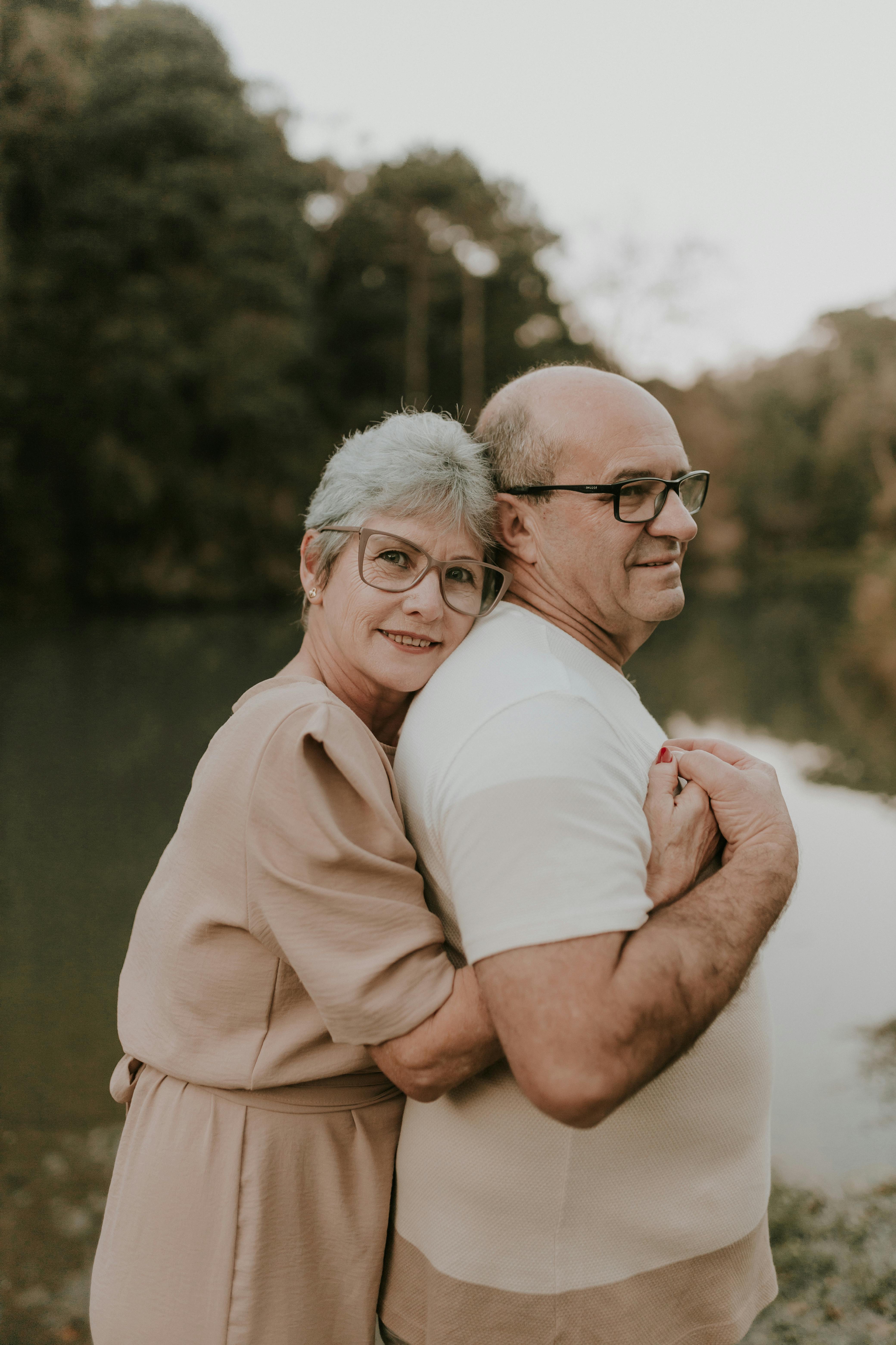 portrait of elderly couple hugging