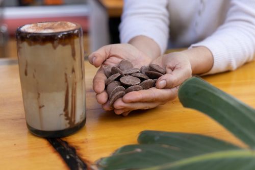 Free Warm beverage served with chocolate, captured in a cozy indoor setting, enhancing the mood of a perfect start to the day. Stock Photo