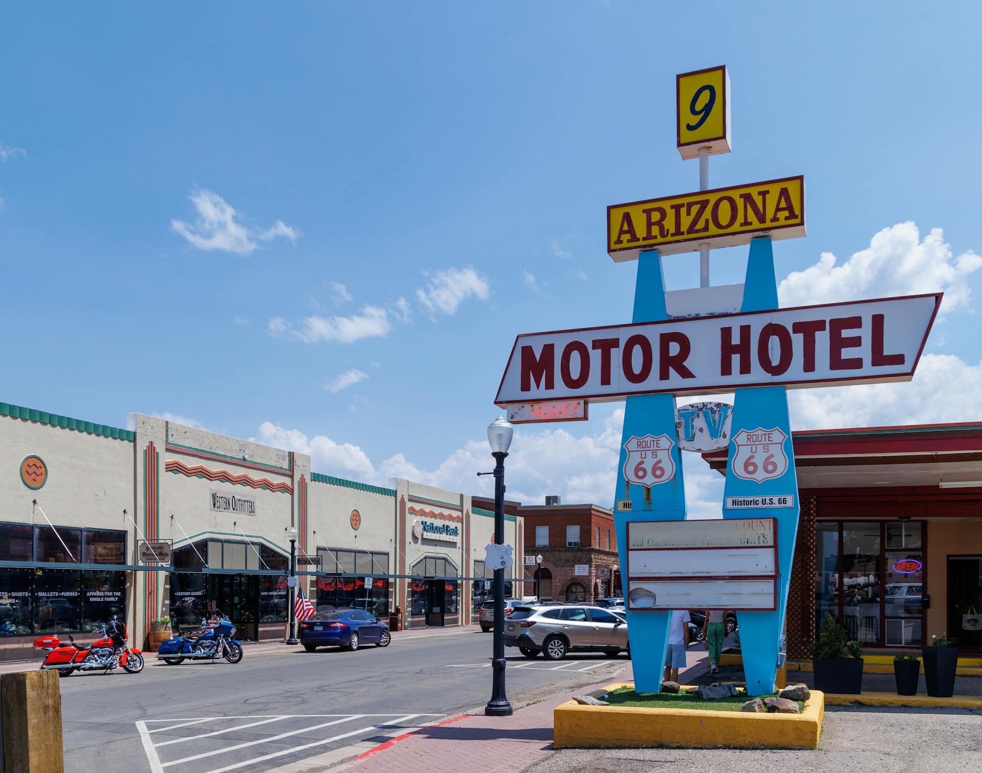 Route 66 motor hotel sign in Williams, Arizona on a sunny day.