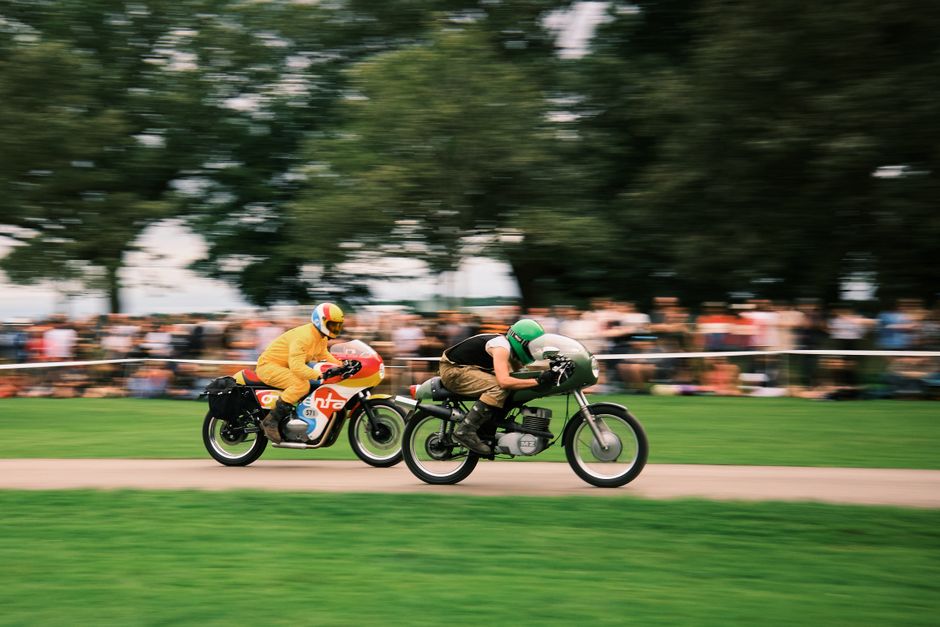 Dynamic capture of a thrilling motorcycle race in Grimsthorpe, showcasing speed and skill.