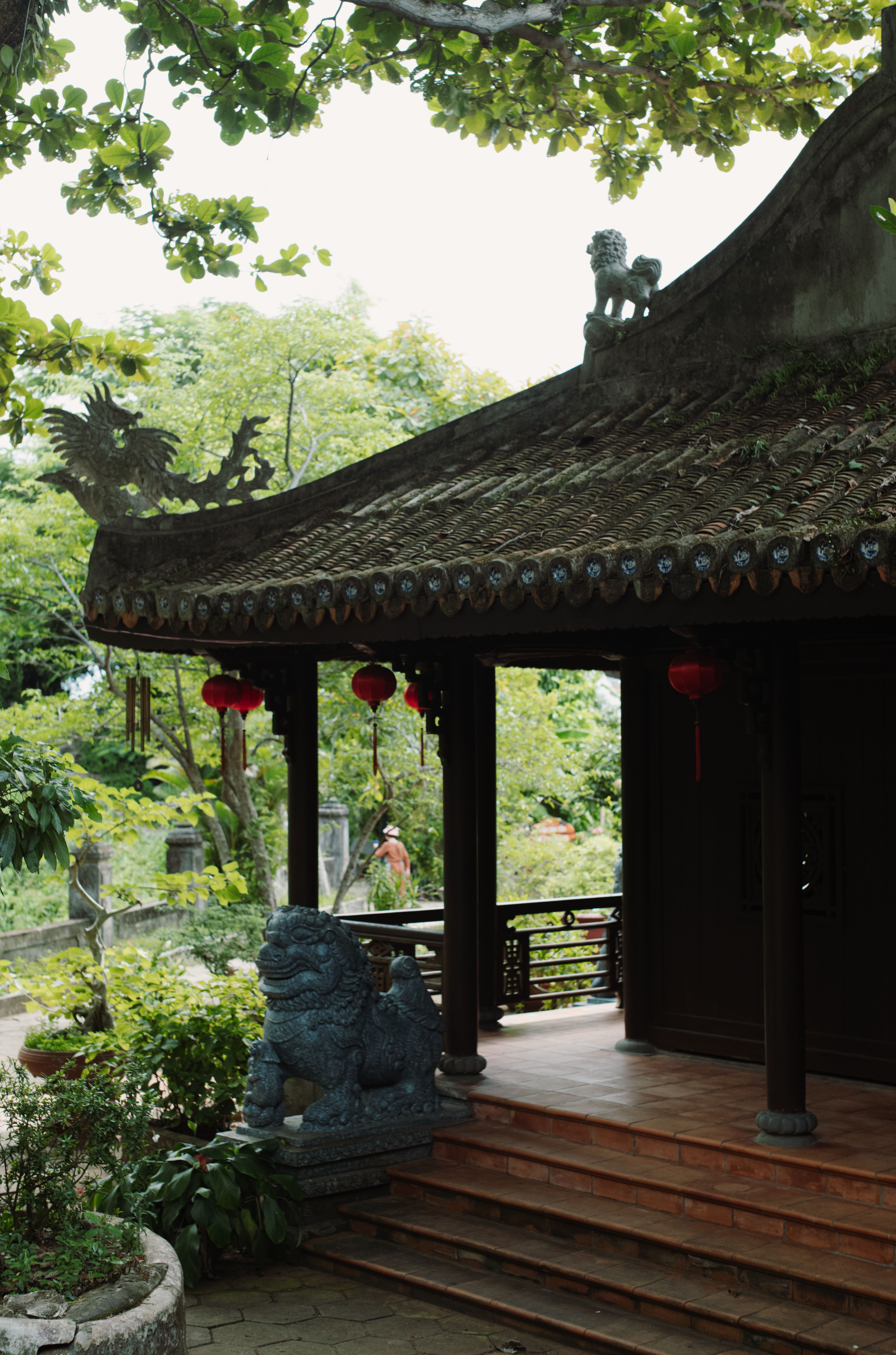 A serene Vietnamese pagoda in Da Nang surrounded by lush greenery and traditional architecture.