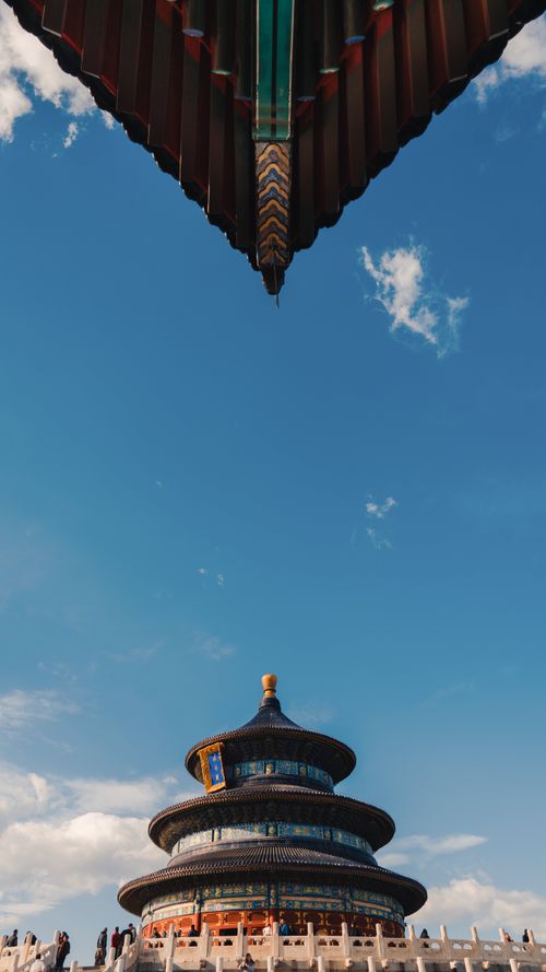 Free A captivating shot of the Temple of Heaven showcasing traditional Chinese architecture under a vast blue sky. Stock Photo
